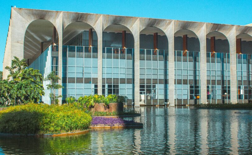 A large building sitting next to a body of water